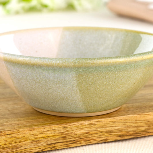 Close-up of Pale Green and White double-dipped small bowl with softly speckled glaze, a wheel-thrown stoneware bowl for dips, olives and little side