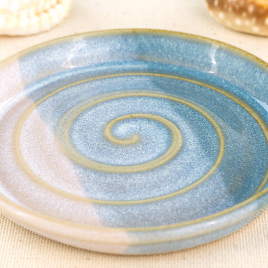 Close-up of Coastal Blue and White soap dish with my signature Sea Smoothed Pebble glaze, banded double dipped ceramic with layered glazes