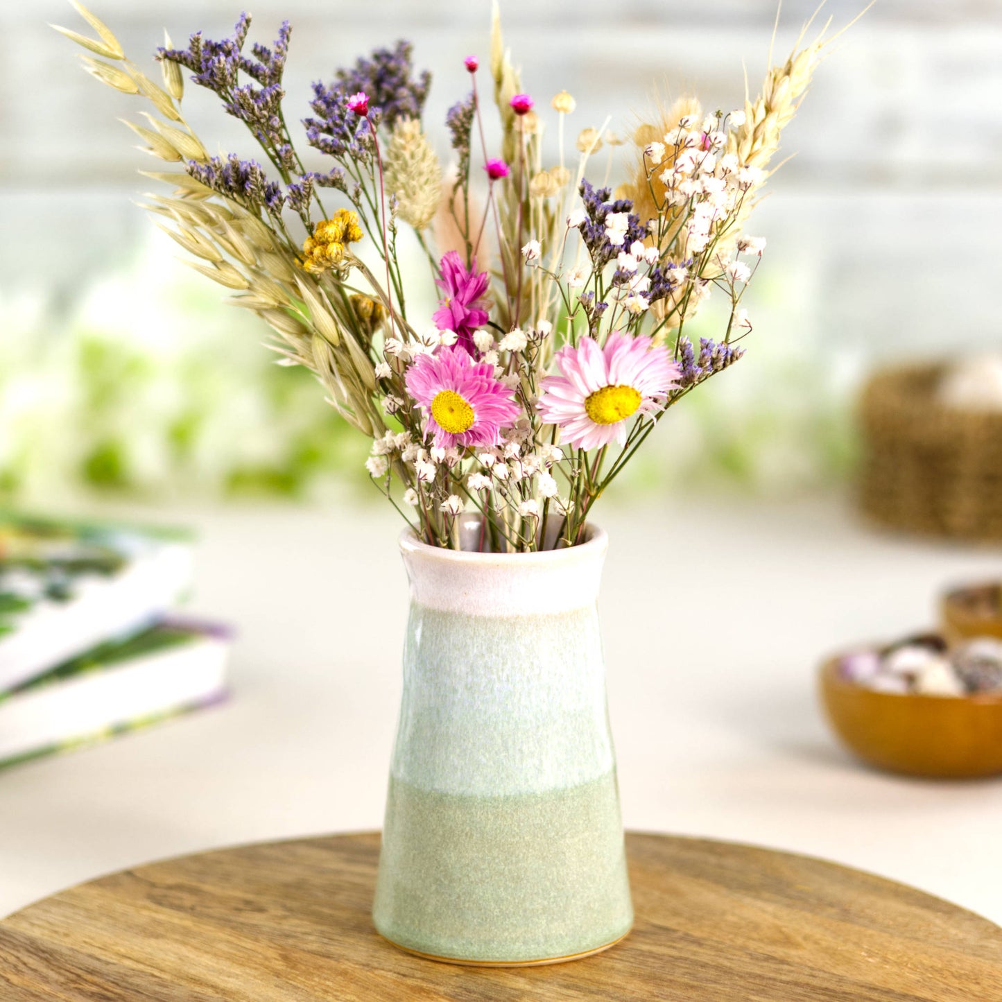 Artisan Pale Green and white pottery bud vase with colourful dried flowers, perfect for cottagecore, botanical, and country-style interiors.