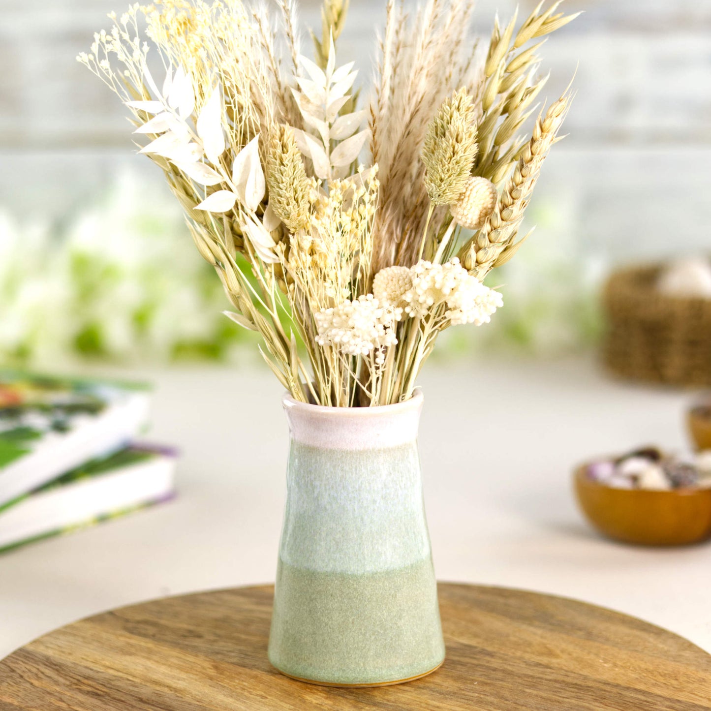 Handcrafted Pale Green and white stoneware bud vase with neutral dried grasses, ideal for Scandi, wabi-sabi, and minimalist interior styling.