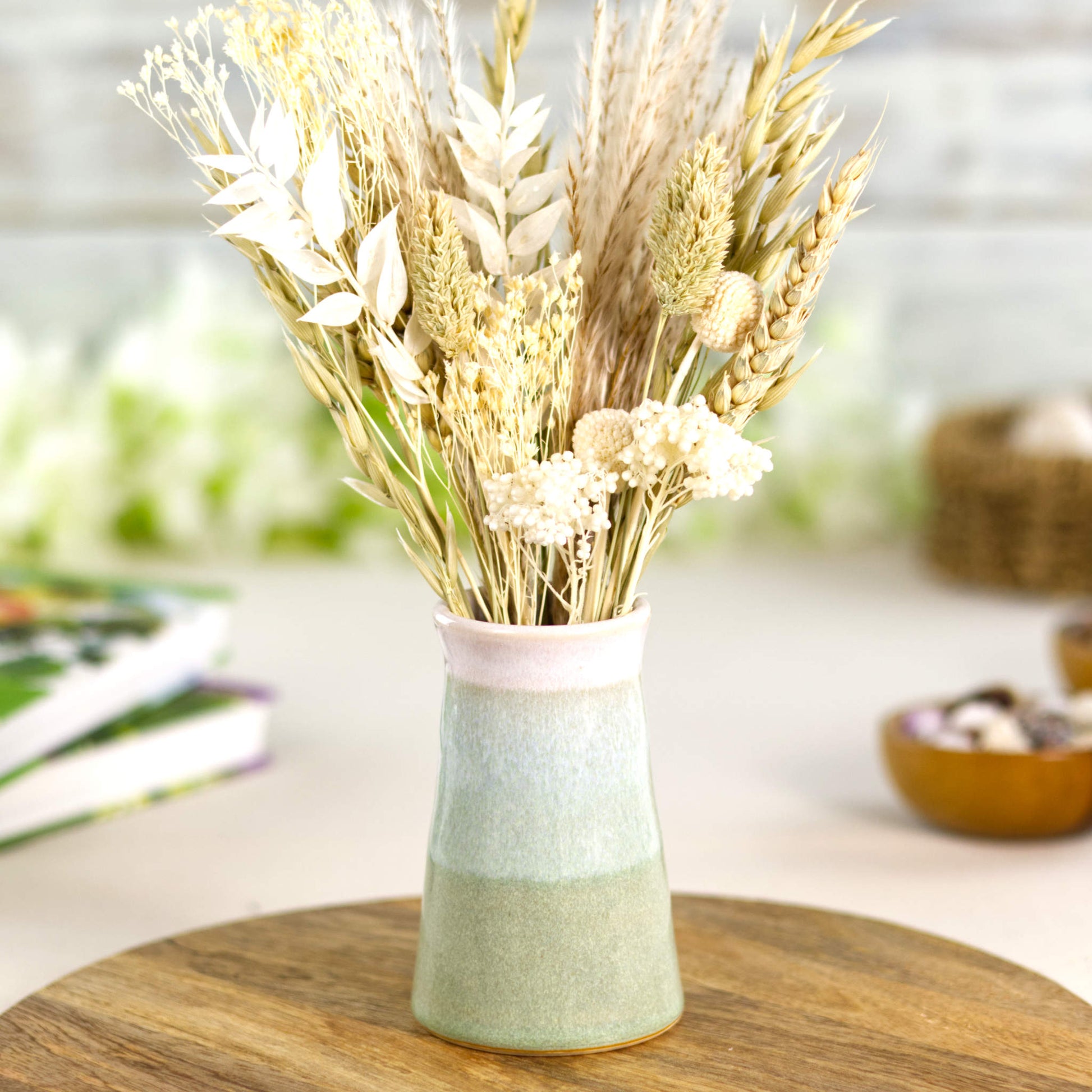 Handcrafted Pale Green and white stoneware bud vase with neutral dried grasses, ideal for Scandi, wabi-sabi, and minimalist interior styling.