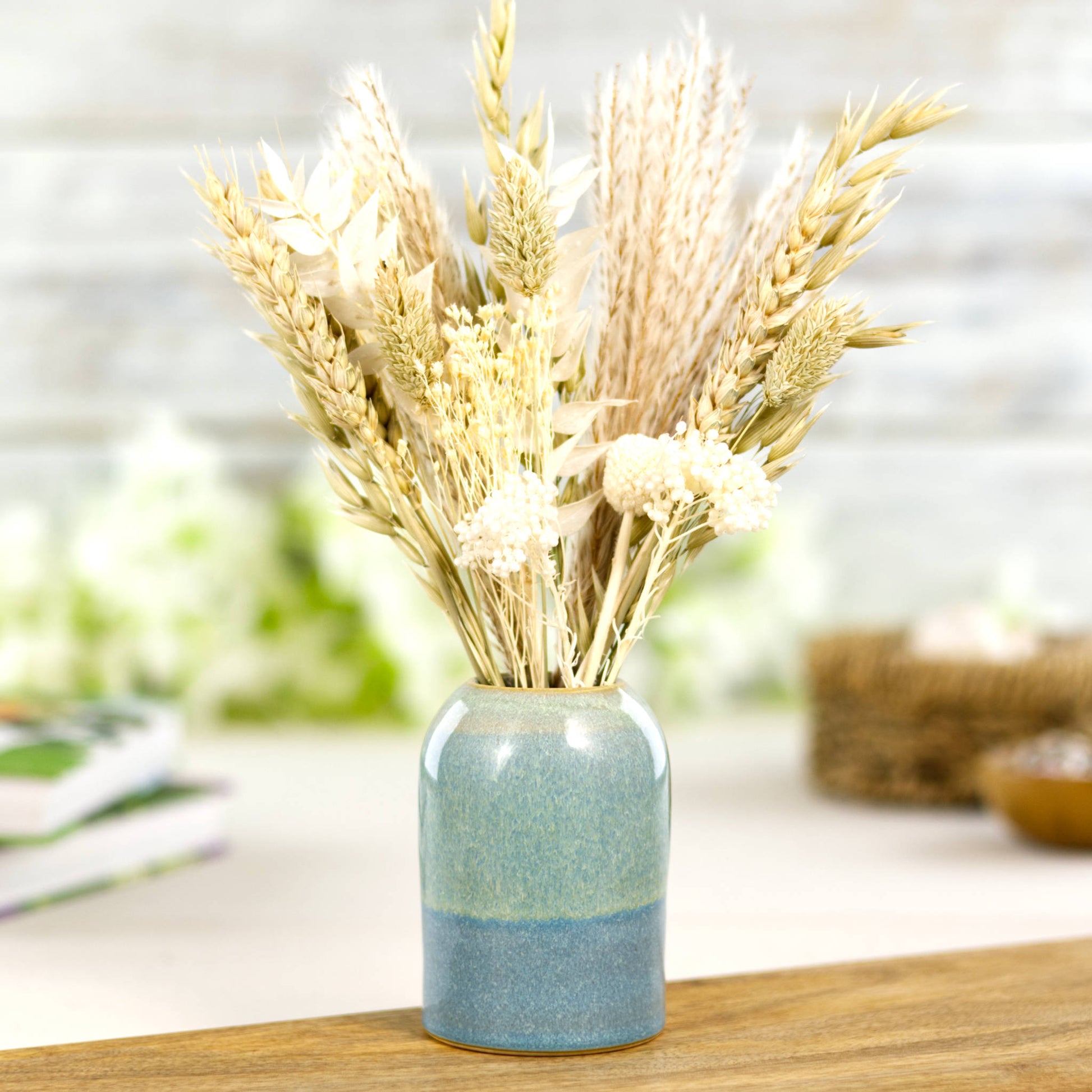 Handmade Coastal Blue and Pale Green ceramic diffuser vessel repurposed as a bud vase with dried flowers, decorative studio pottery accent
