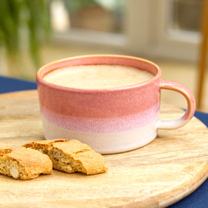 Coral and White cappuccino cup filled with coffee on round board, handmade ceramic cup for cosy mornings and café moments