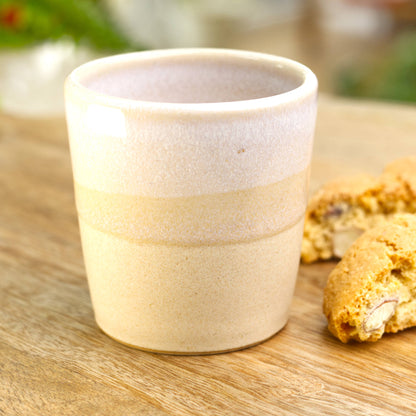 Handmade stoneware espresso cup made in a Sussex studio, with biscotti