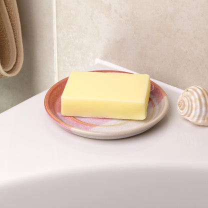 Coral and white soap saver holding cream soap bar, handmade ceramic bathroom decor with soft colour matched tones
