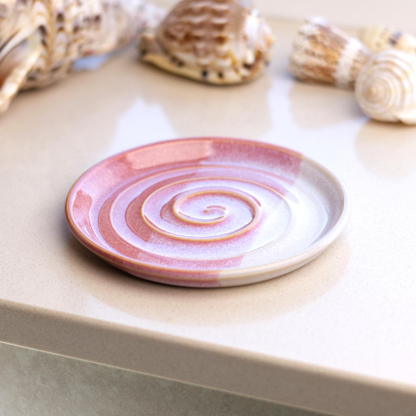 Coral and white ceramic soap tray on bathroom windowsill, handmade coastal decor soap dish with warm layered glazes