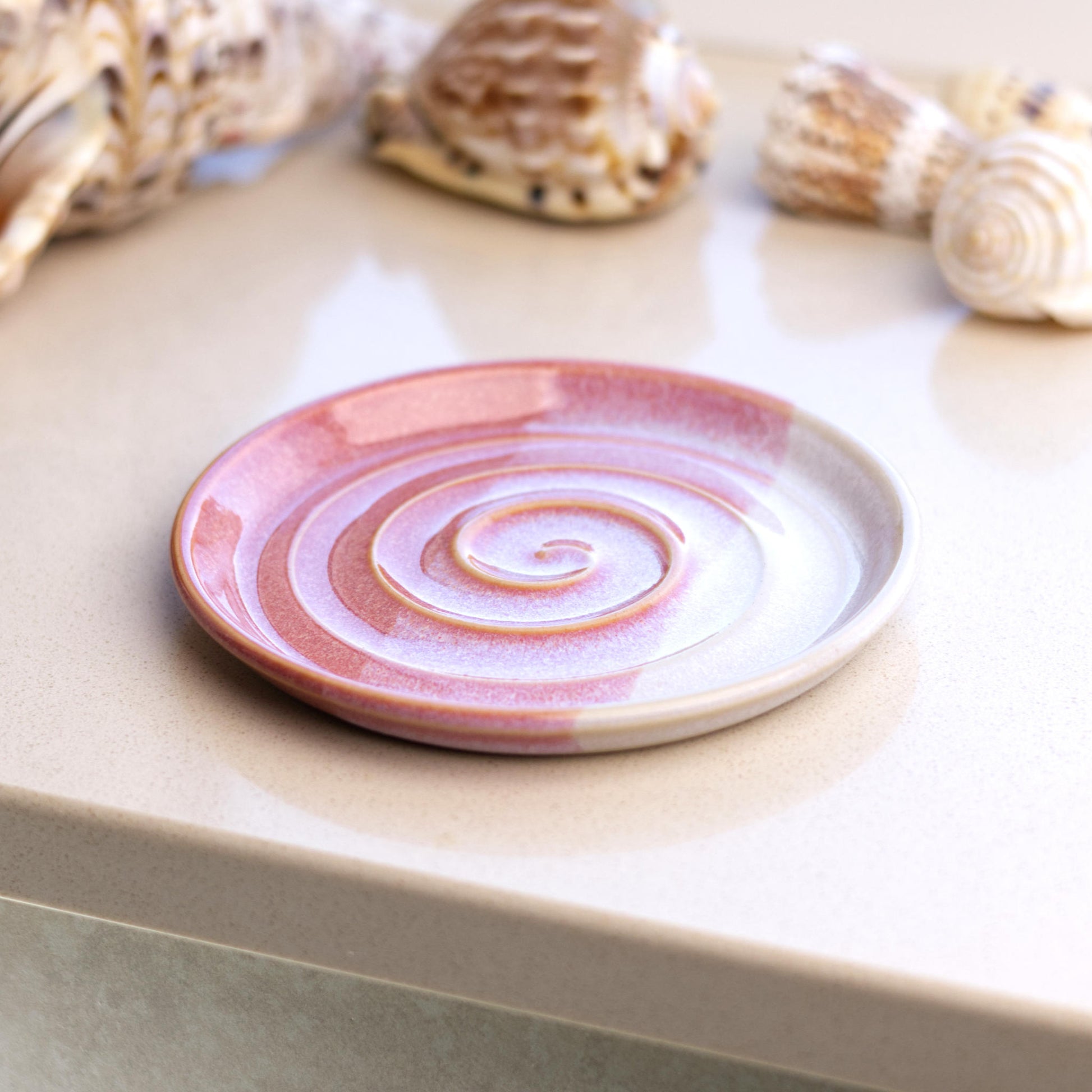 Coral and white ceramic soap tray on bathroom windowsill, handmade coastal decor soap dish with warm layered glazes