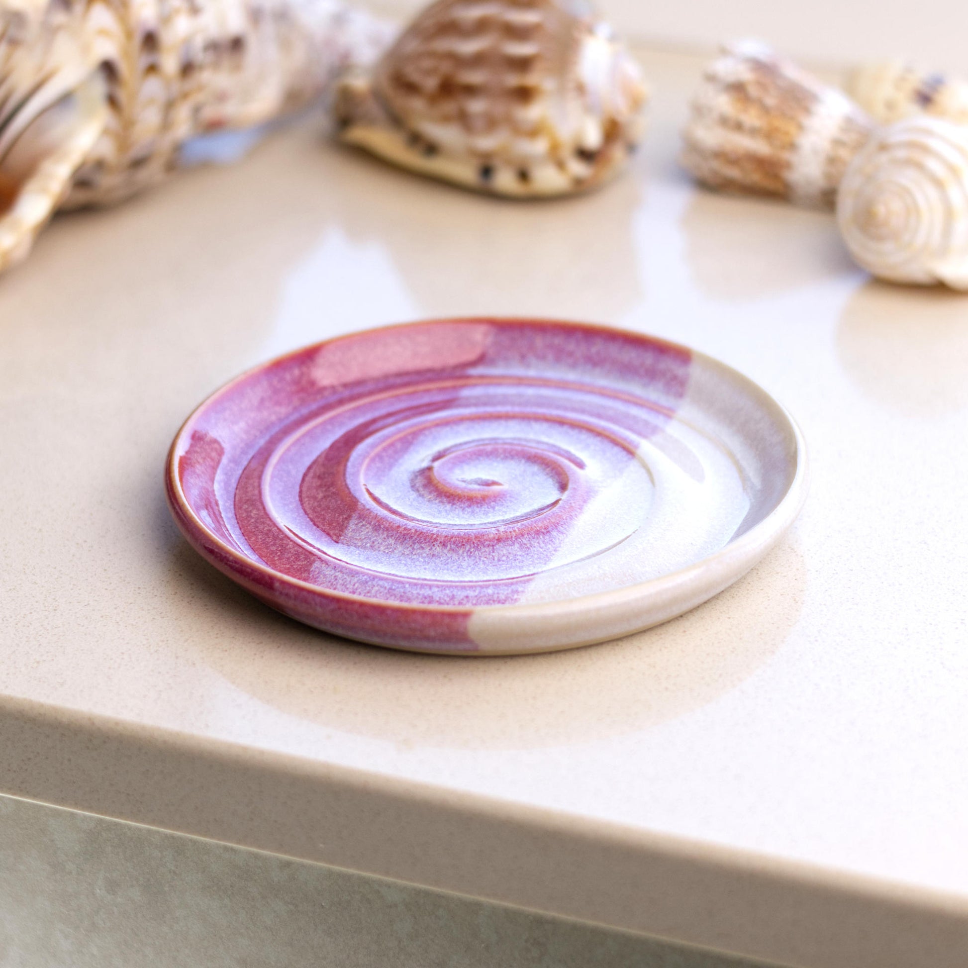 Crimson and white ceramic soap tray on bathroom windowsill, handmade bathroom decor soap dish with rich layered glazes
