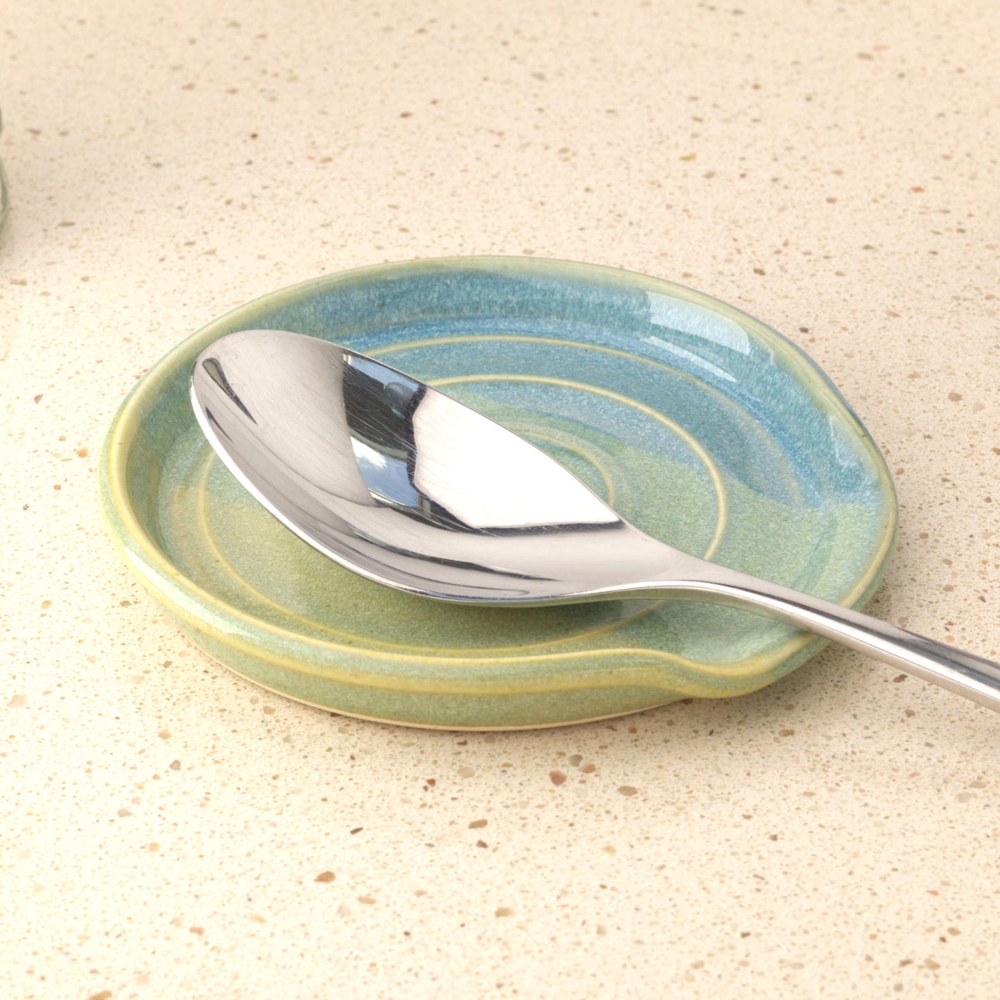 Coastal Blue and Pale Green handmade pottery spoon rest holding tablespoon, practical ceramic spoon holder for cooking utensil drips and kitchen styling