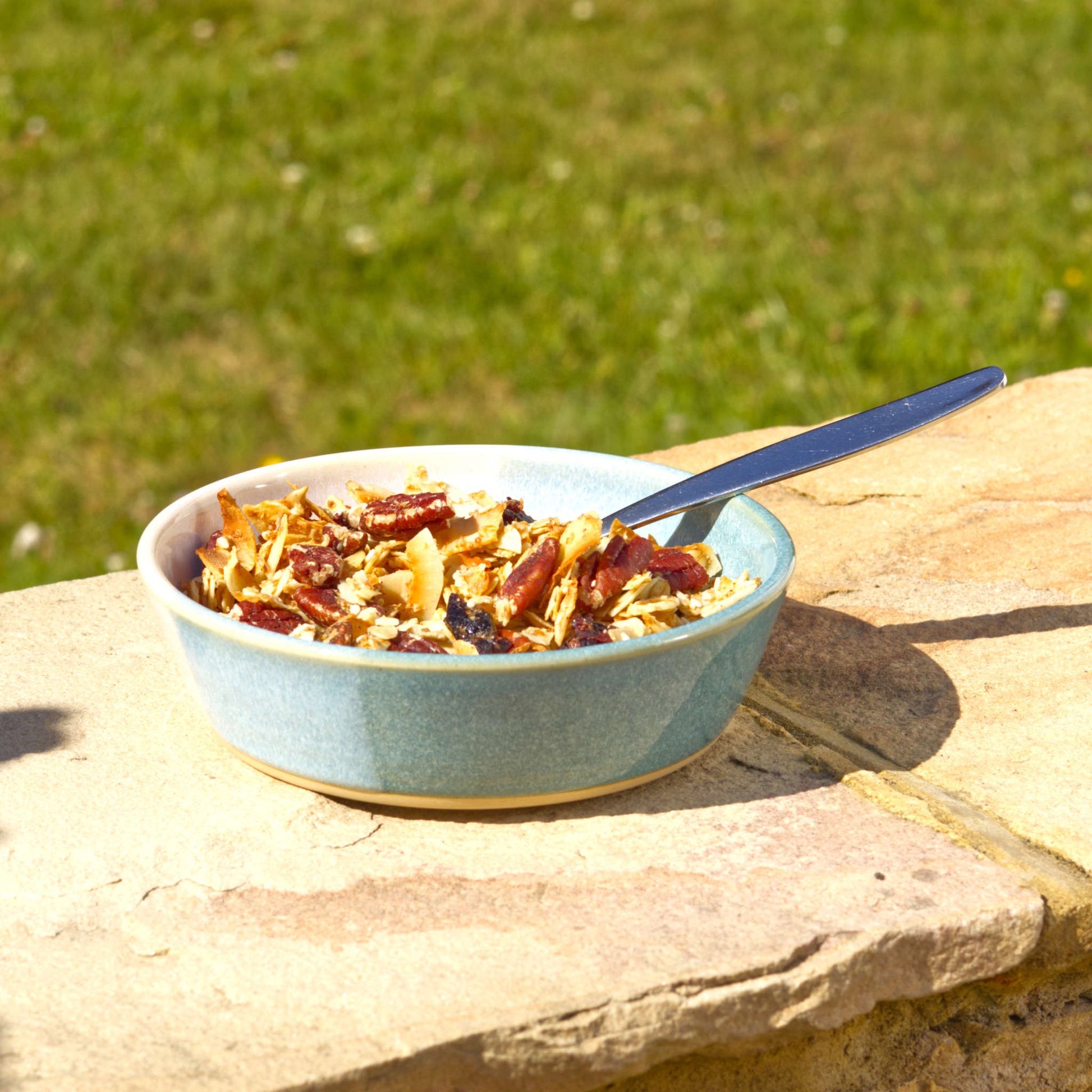 Coastal Blue & White handmade tapas bowl used outdoors for granola, a small ceramic serving dish for alfresco breakfasts, snacks and relaxed garden dining