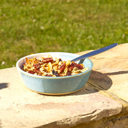 Coastal Blue & White handmade tapas bowl used outdoors for granola, a small ceramic serving dish for alfresco breakfasts, snacks and relaxed garden dining