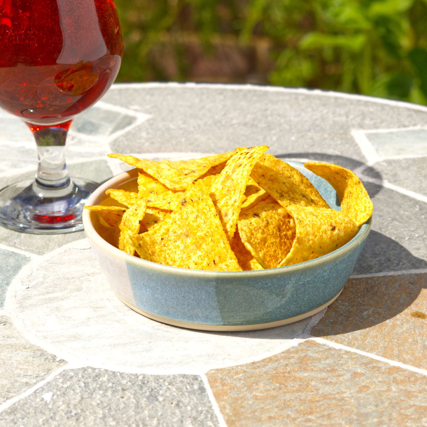 Coastal Blue & White ceramic tapas bowl filled with tortilla chips beside a drink, perfect for nibbles, BBQ snacks, party food and summer sharing