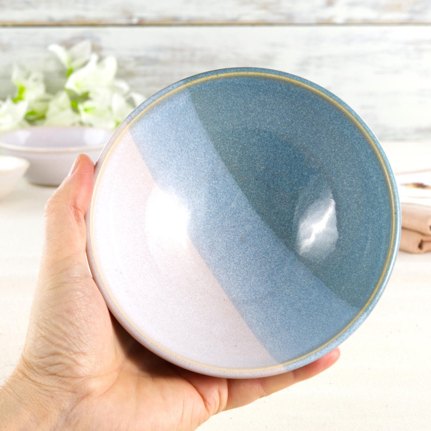 Coastal Blue and White handmade ceramic bowl held in hand, a medium stoneware bowl for cereal, porridge, soup, noodles and cosy everyday meals