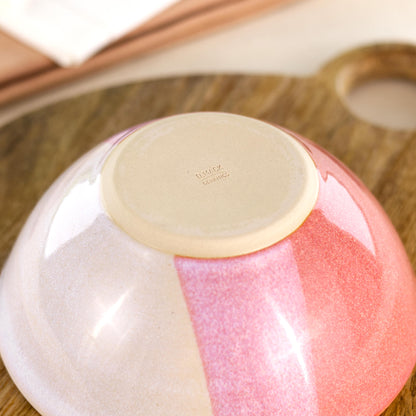 Base of Coral and White handmade medium bowl showing my maker’s mark and smooth burnished foot, designed to help reduce surface scratching