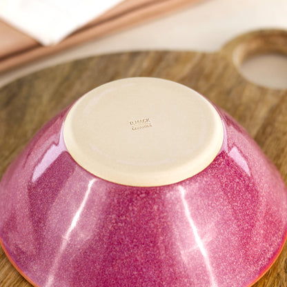 Base of a wheel-thrown medium stoneware bowl in Crimson, showing the D Mack Ceramics makers mark and smooth burnished foot, handmade in a small British pottery studio