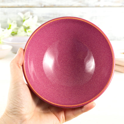 Medium pottery bowl held in the hand, glazed in deep Crimson with a warm handcrafted feel, ideal for soups, ramen, breakfast bowls or everyday dining