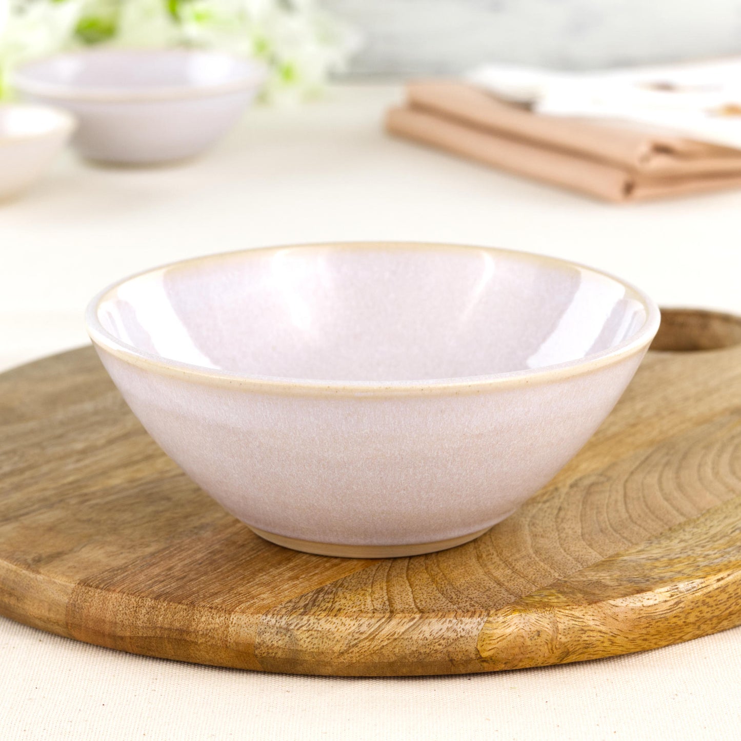Wheel-thrown white medium bowl on a wooden board, a versatile piece of British studio pottery for minimalist dining, rustic table settings and handmade home decor