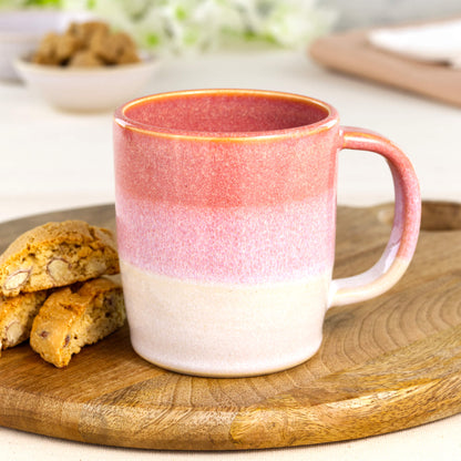 Coral and White handmade ceramic mug on a wooden board with biscotti, a wheel-thrown stoneware coffee mug for cosy everyday use
