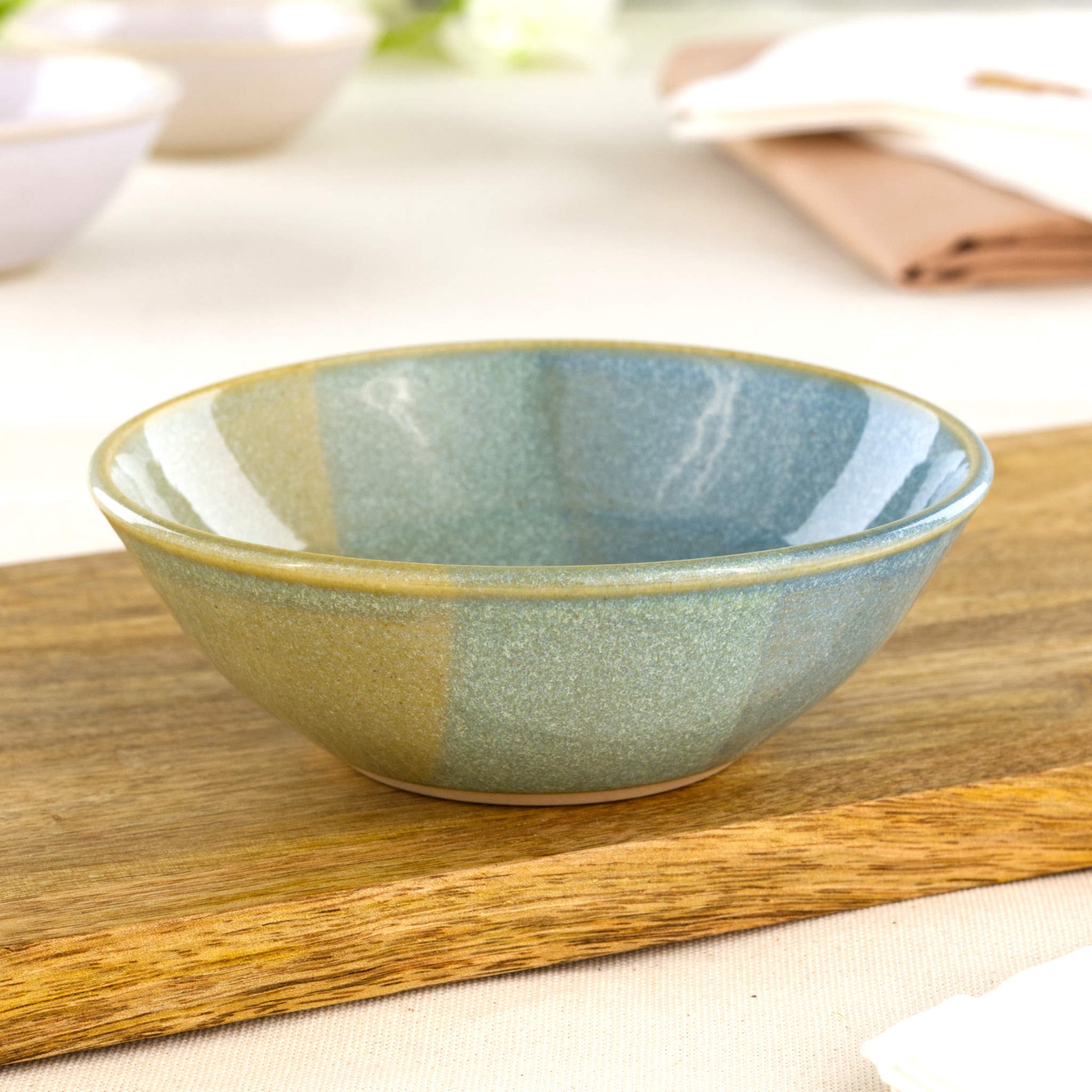 Blue and Green small handmade stoneware bowl on wooden board, a wheel-thrown ceramic bowl for tapas, desserts, condiments and stylish everyday dining