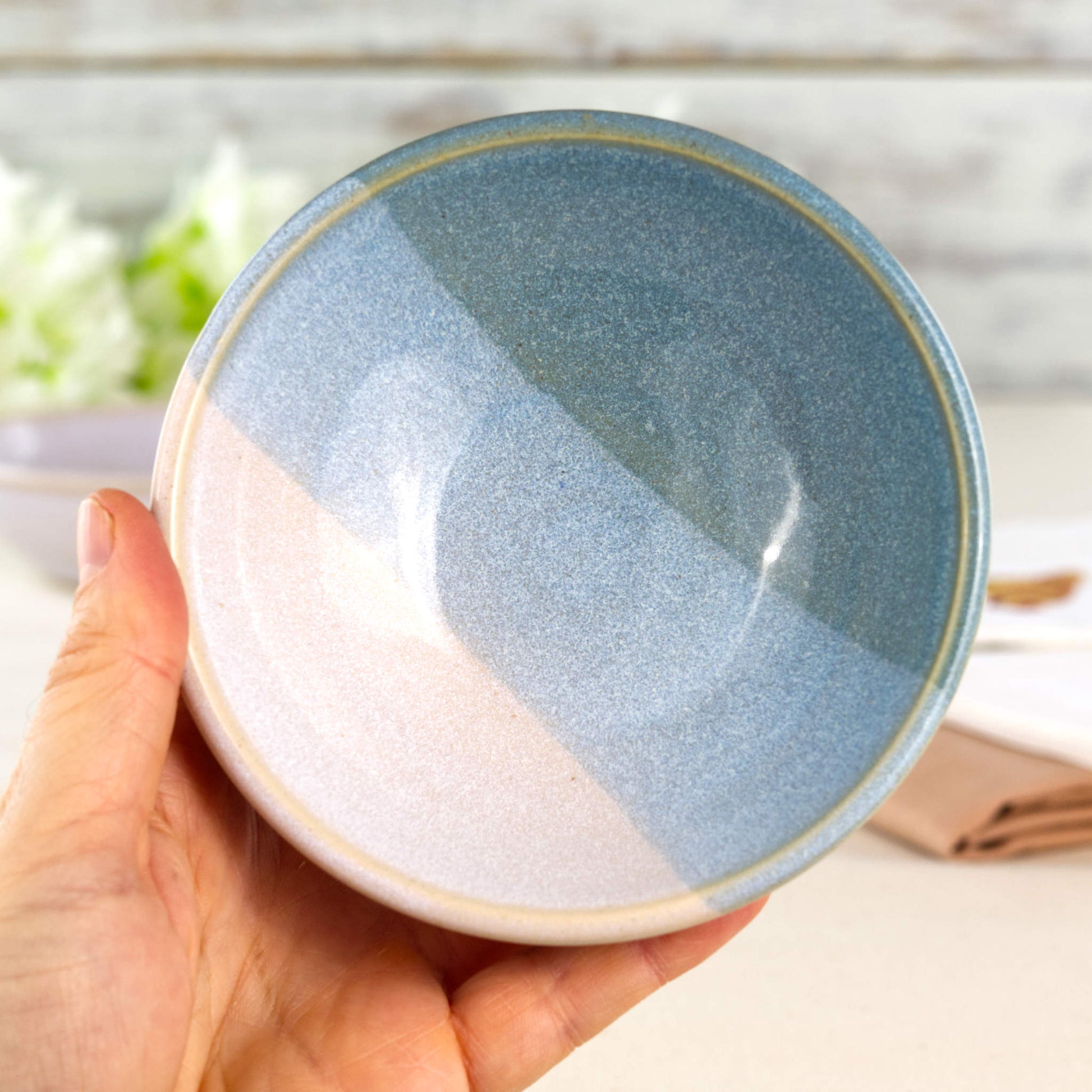 Coastal Blue and White handmade ceramic bowl held in hand, a small snack bowl for olives, dips, nuts and little desserts