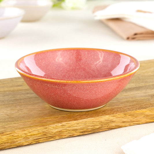 Coral small pottery bowl on wooden board, ideal for tapas, nuts, sweets, desserts and colourful garden party table styling