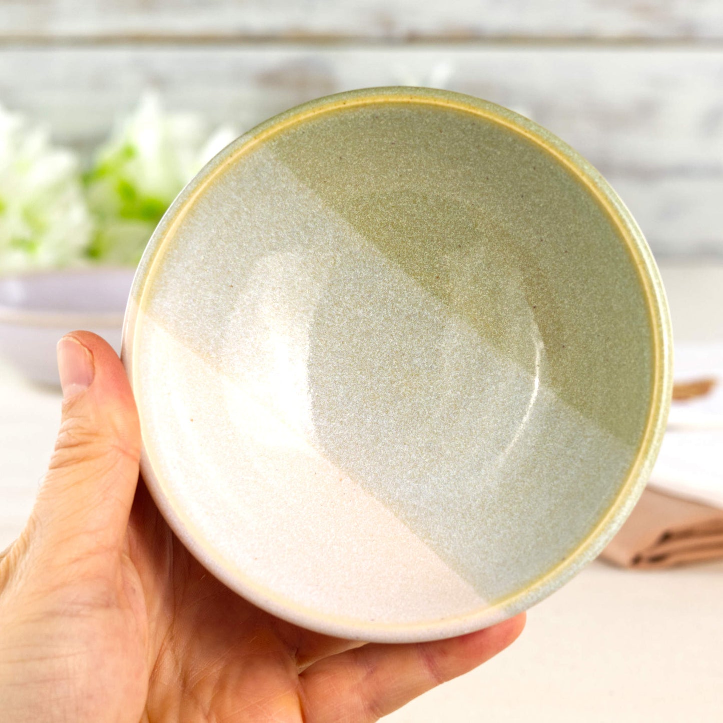Pale Green and White handmade ceramic bowl held in hand, a small two-tone serving bowl for nuts, nibbles, sauces or individual desserts