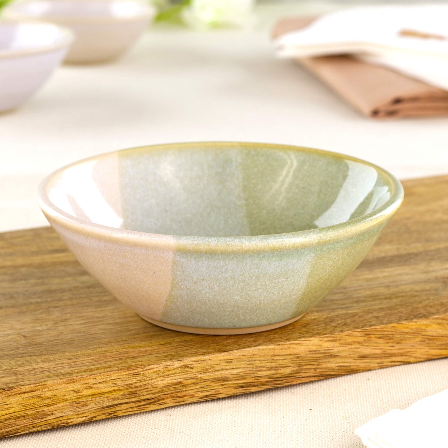 Pale Green and White small pottery bowl on a wooden board, a handmade stoneware snack bowl for relaxed entertaining, mezze spreads and everyday table styling