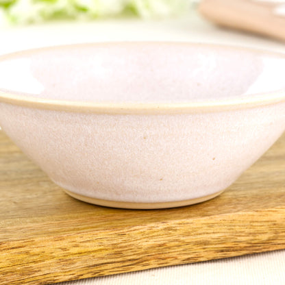 Close-up of White Sea Smoothed Pebble glaze on a wheel-thrown small bowl with soft speckling and simple scandi style
