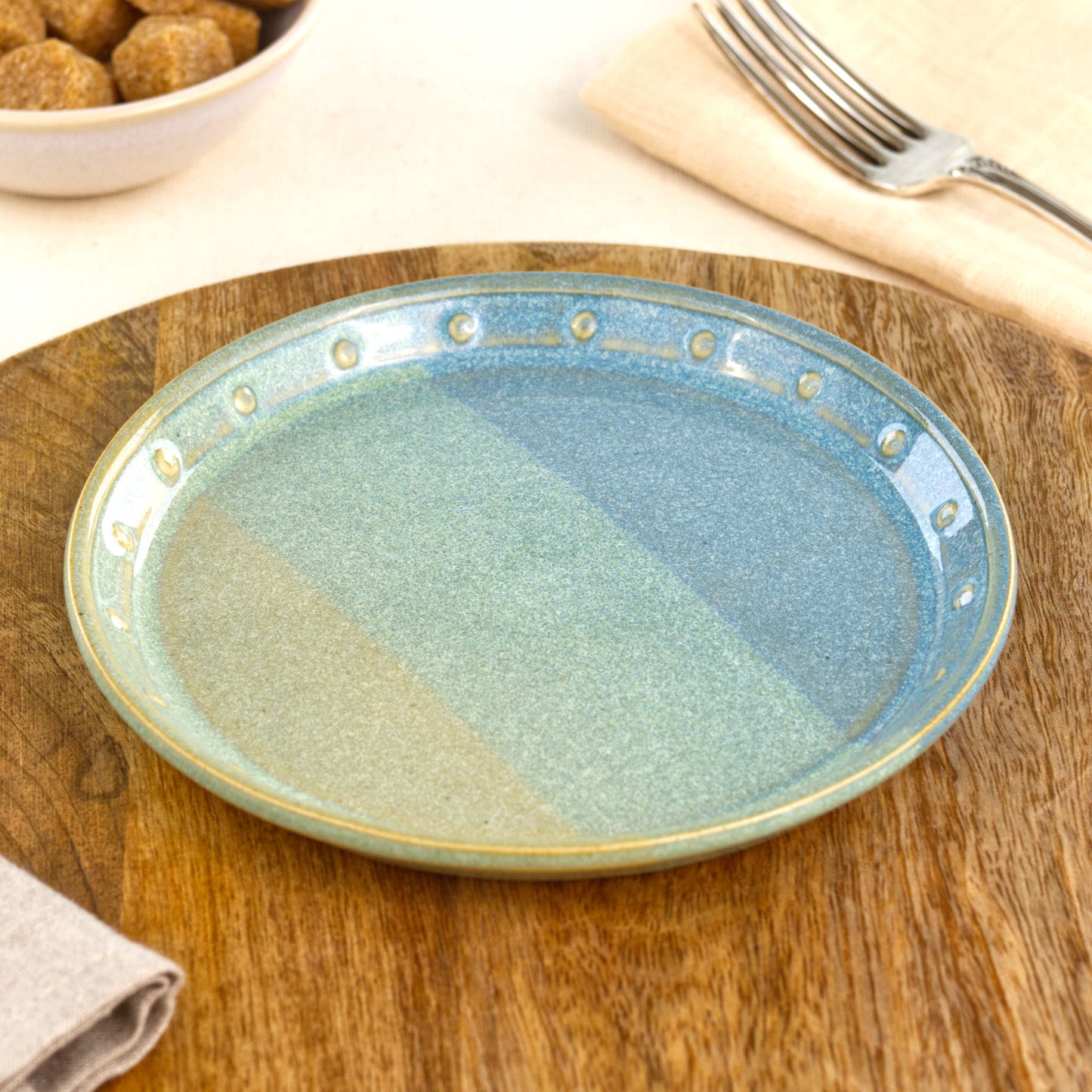 Coastal Blue & Pale Green small plate on a wooden board, a handmade ceramic side plate for bread, cake, snacks, starters or relaxed everyday dining