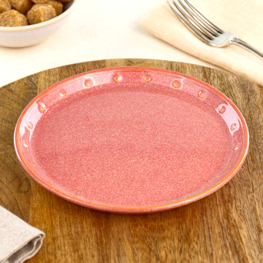 Coral small plate on a wooden board, a handmade ceramic side plate for cake, pastries, snacks, light lunches or relaxed everyday tableware