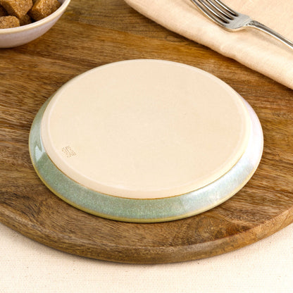 Base of a handmade Pale Green & White small plate, showing the smooth burnished foot and makers mark, wheel-thrown in a small Sussex pottery studio