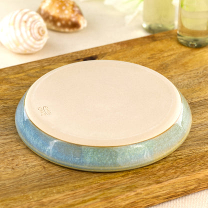 Underside of Coastal Blue and Pale Green soap dish with makers mark, burnished smooth base from Sussex artisan pottery studio