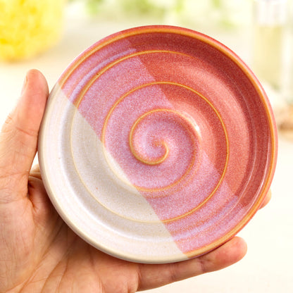 Coral and white ceramic soap holder in hand, wheel-thrown handmade soap tray with banded striped glaze finish