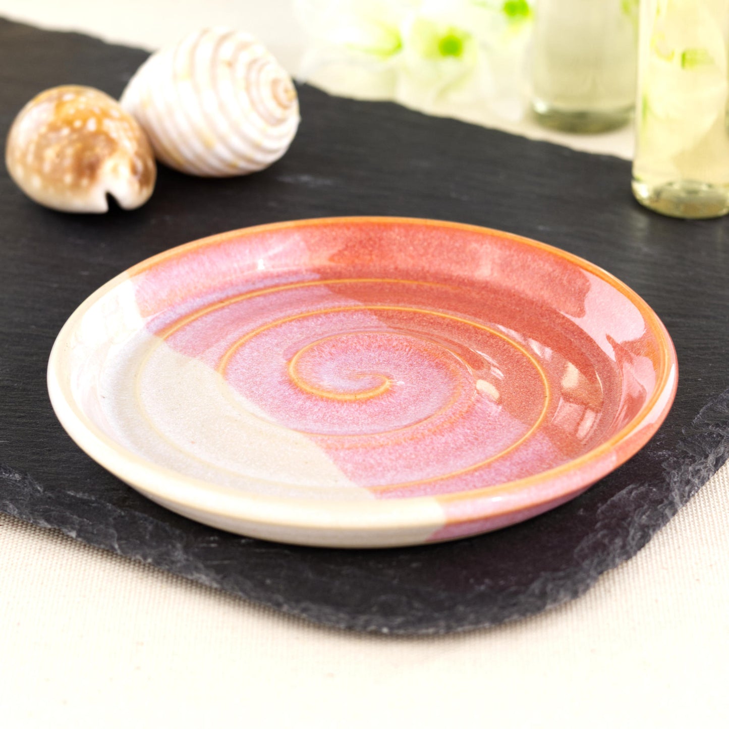 Handmade coral and white soap dish on slate board, double dipped ceramic soap saver with spiral ridges and glossy layered glaze