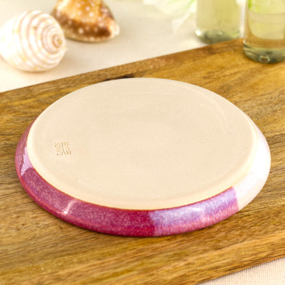 Base of crimson and white soap dish with artisan makers mark, smooth burnished underside from small Sussex pottery studio