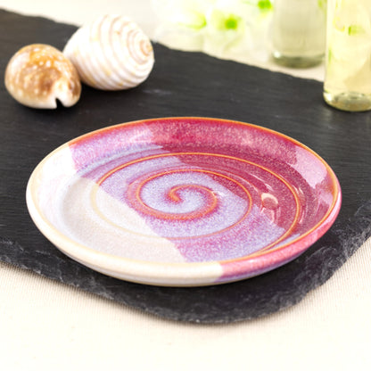 Handmade crimson and white soap dish on slate board, double dipped ceramic soap saver with spiral ridges and glossy layered glaze