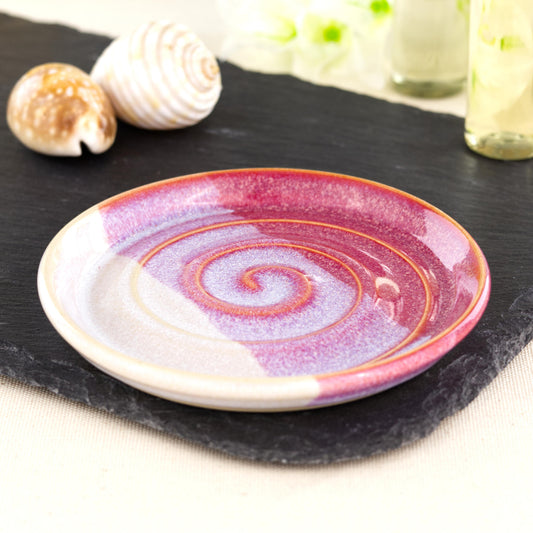 Handmade crimson and white soap dish on slate board, double dipped ceramic soap saver with spiral ridges and glossy layered glaze
