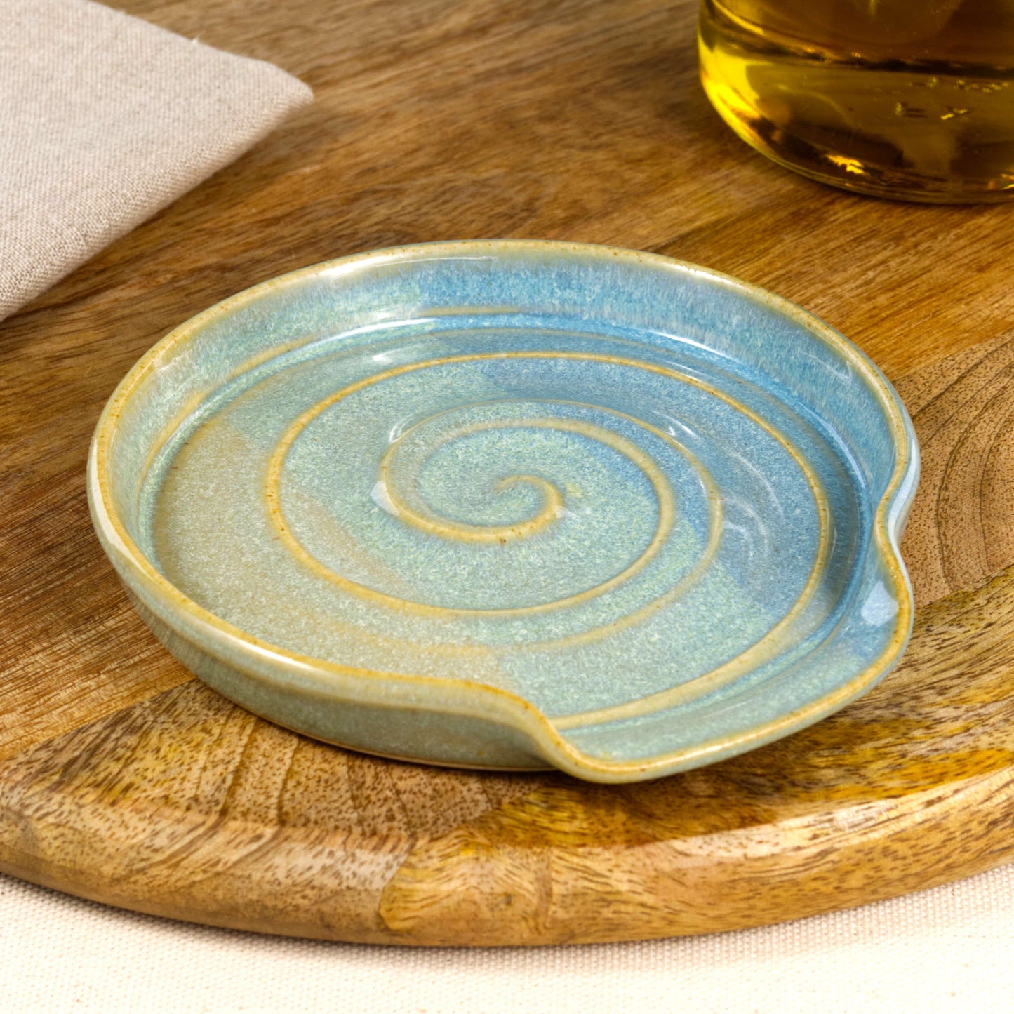 Handmade ceramic spoon rest in Coastal Blue and Pale Green, wheel-thrown stoneware spoon holder with spiral design, artisan kitchen decor gift