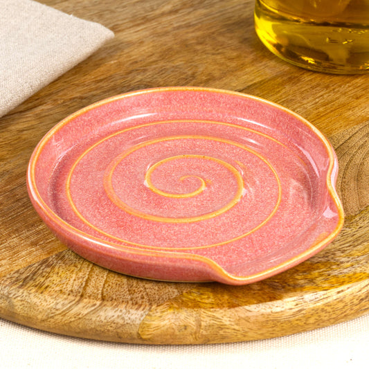 Handmade Coral ceramic spoon rest, wheel-thrown stoneware spoon holder with spiral design, artisan kitchenware gift from Sussex
