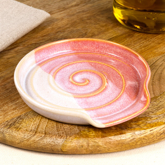 Handmade ceramic spoon rest in Coral and White, wheel-thrown utensil holder with spiral well and glossy speckled glaze